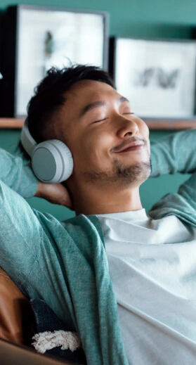 a man listening to music during ketamine treatment