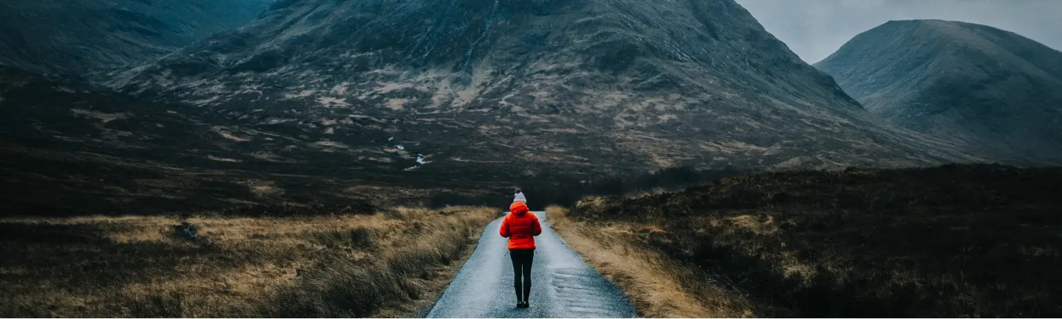 a woman walking and considering ketamine for substance abuse