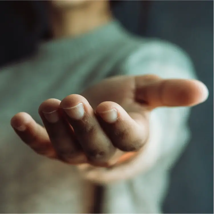 a man in ketamine treatment reaching out his hand